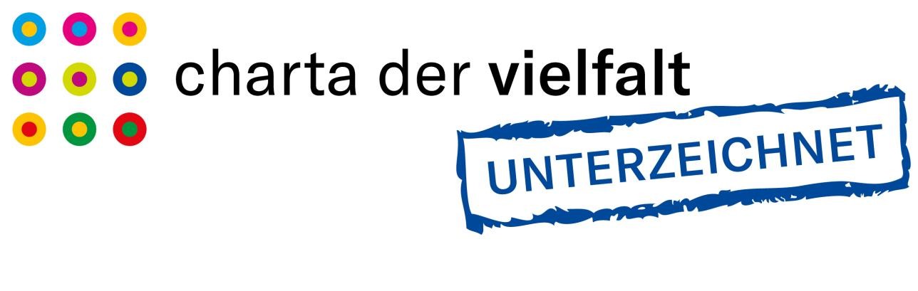 Logo Charta der Vielfalt. Bunte Punkte und der Schriftzug Charta der Vielfalt unterzeichnet