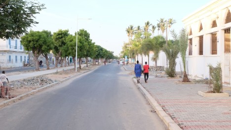 Street with two people in Saint-Louis, Senegal