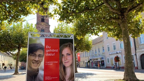 Poster displayed in Rastatt, title "You belong!" - Link to the page Living together in diversity