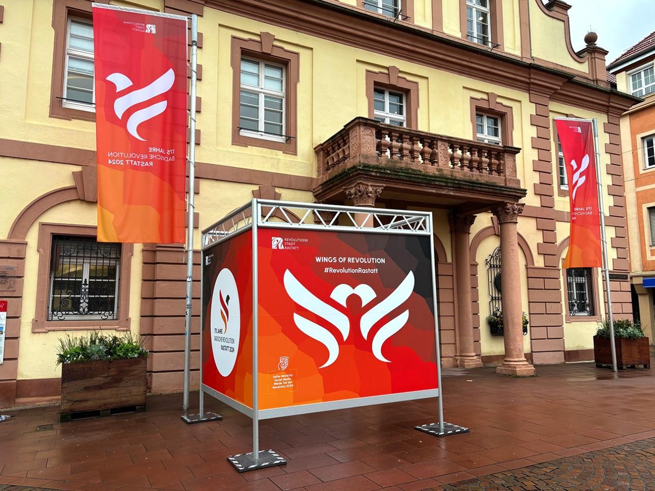Information cube in front of the historic town hall in Rastatt