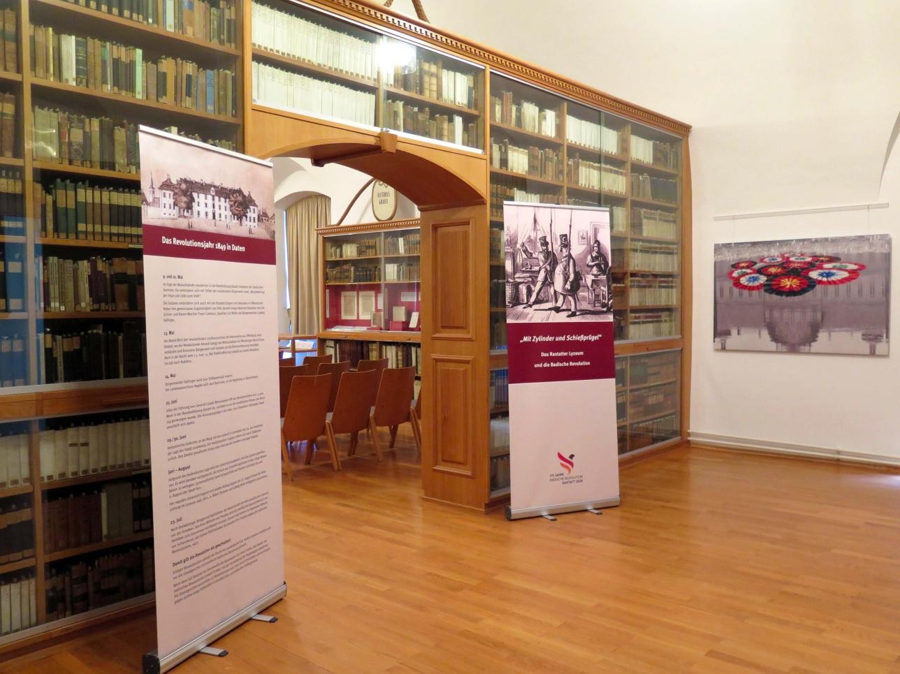 Exhibition room with photos and information on the special exhibition: "For Freedom! Rastatt and the 1848/49 Revolution" at the Rastatt City Museum